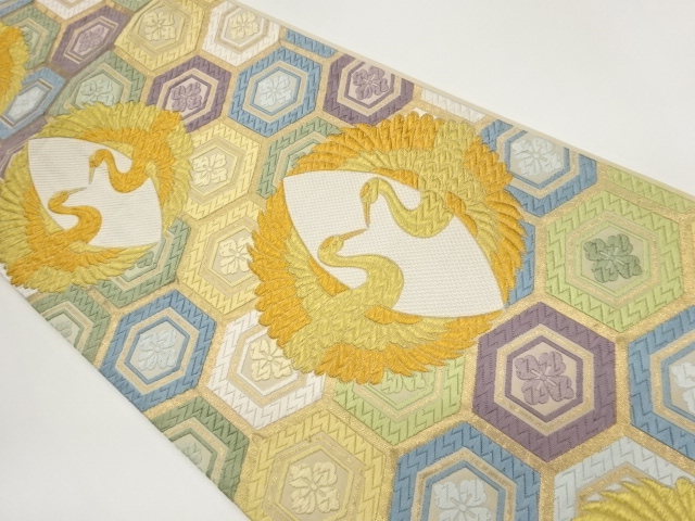 向かい鶴に亀甲・花菱模様織出し袋帯